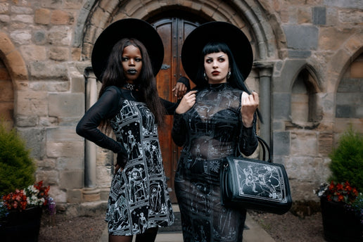 Two models wearing our Tarot collection and witch brim hats