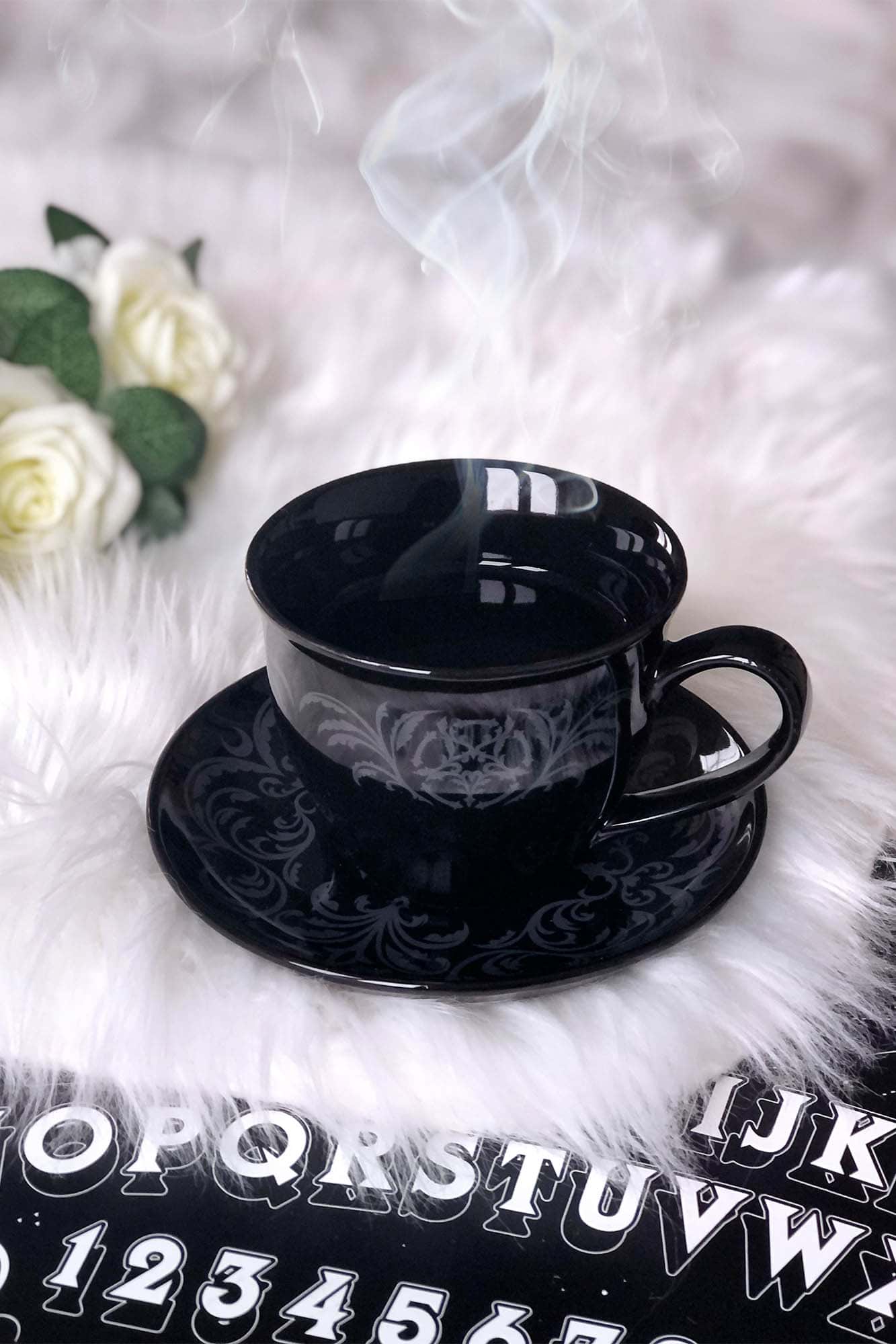 https://us.killstar.com/cdn/shop/products/MORTICIA-XL-TEACUP-AND-SAUCER-B.jpg?v=1609854534